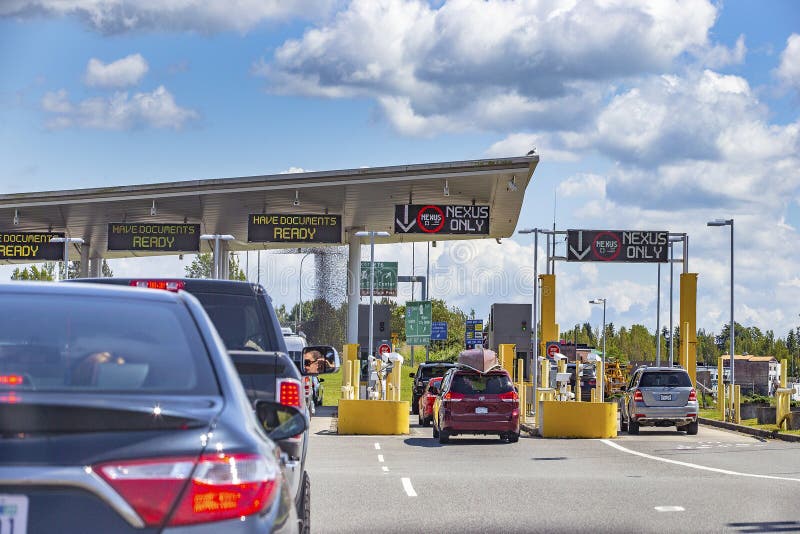 US/Canada Border, Peace Arch, Washington state, USA -  Busy border crossing between US and Canada. US/Canada Border, Peace Arch, Washington state, USA -  Busy border crossing between US and Canada.