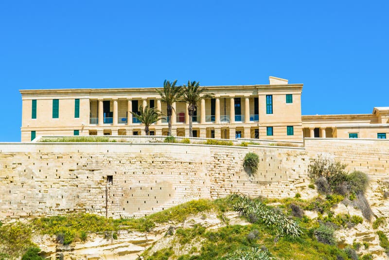 Beautiful landscape of the maltese mediterranean coast with view to Villa Bighi from the Grand Harbour, Kalkara, Malta