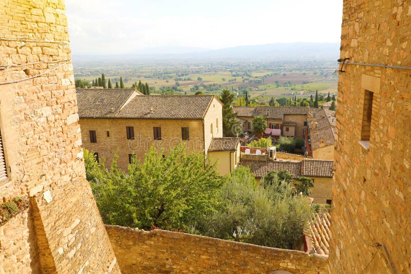 Beautiful glimpse view from old Italian city in Assisi, Umbria, Italy. Beautiful glimpse view from old Italian city in Assisi, Umbria, Italy.