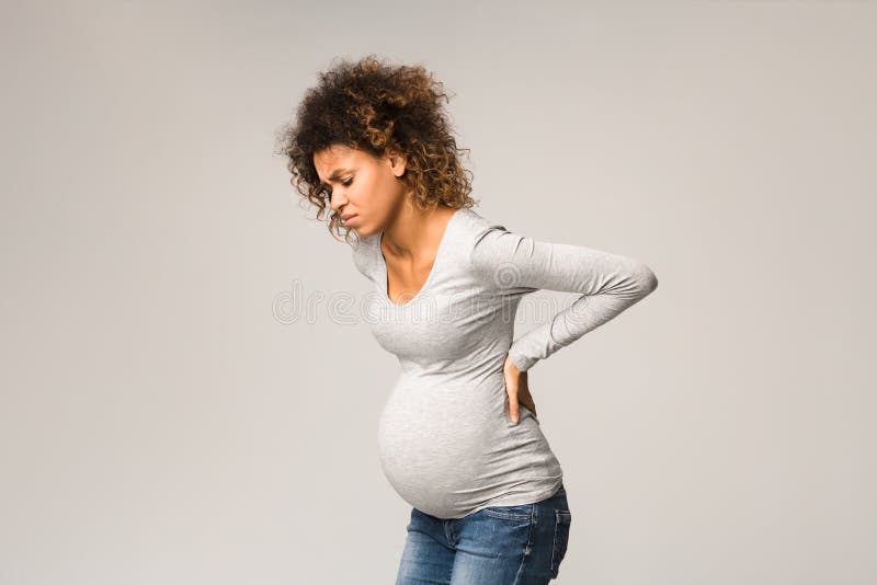 Pregnant Woman with Contractions, Touching Her Back 库存图片 图片 包括有 分娩