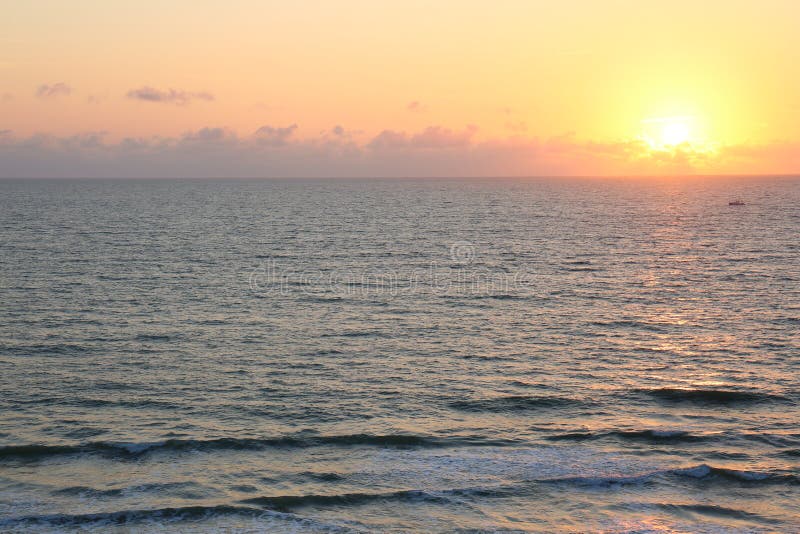 Early morning ocean sunrise in Vero Beach Florida with a beautiful sky and soft waves coming in and the sun just coming up over the horizon.
This image is perfect for graphic design, web design and video/film. Early morning ocean sunrise in Vero Beach Florida with a beautiful sky and soft waves coming in and the sun just coming up over the horizon.
This image is perfect for graphic design, web design and video/film.