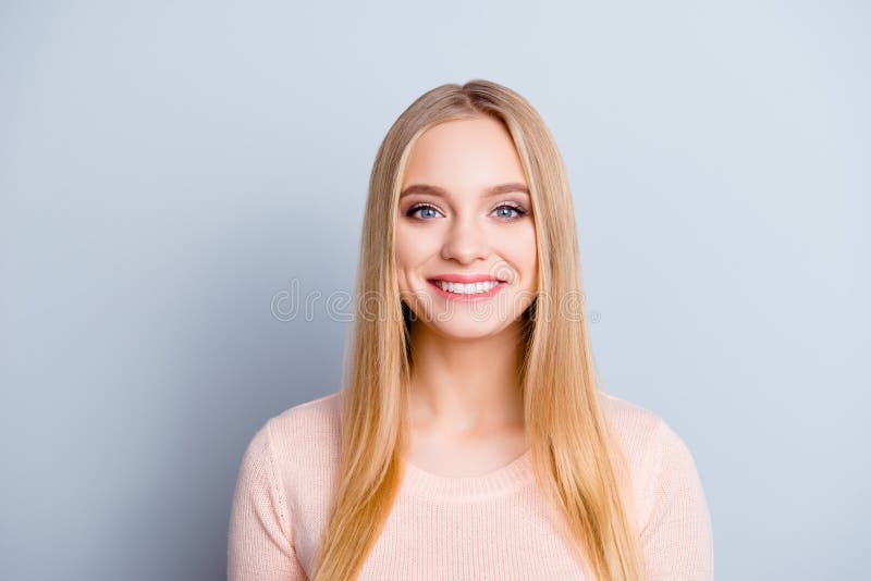 People girlish feminine teenager person concept. Close up portrait of beautiful lovely sweet with toothy beaming smile long smooth straight hairdo girl wearing beige pullover isolated gray background. People girlish feminine teenager person concept. Close up portrait of beautiful lovely sweet with toothy beaming smile long smooth straight hairdo girl wearing beige pullover isolated gray background