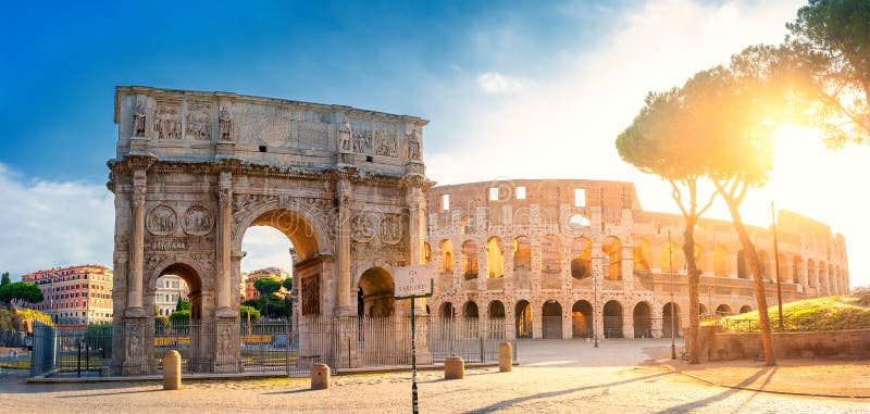 Panorama of the Arch of Constantine and the Colosseum in the morning sun. Rome architecture and landmark, Italy. Europe. Panorama of the Arch of Constantine and the Colosseum in the morning sun. Rome architecture and landmark, Italy. Europe