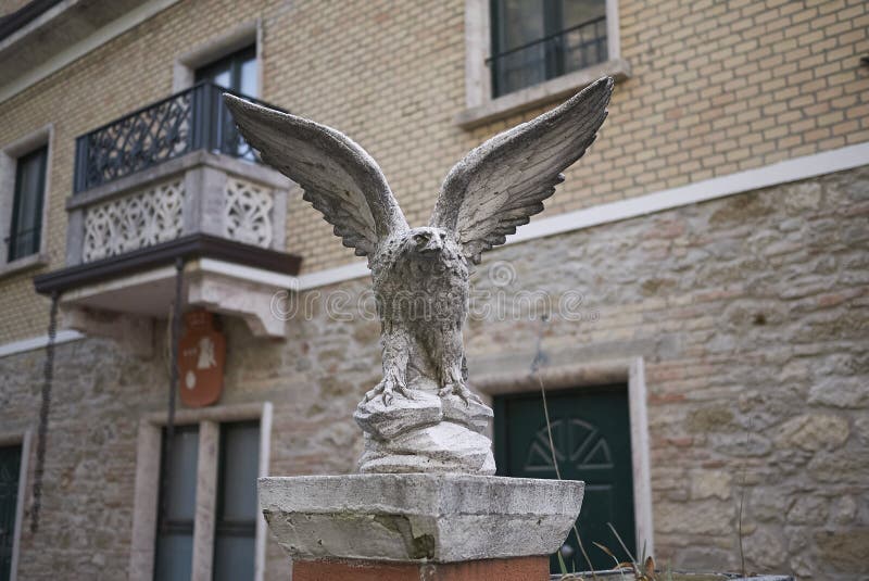 Eagle stone statue stock photo. Image of culture, predappio 110634792