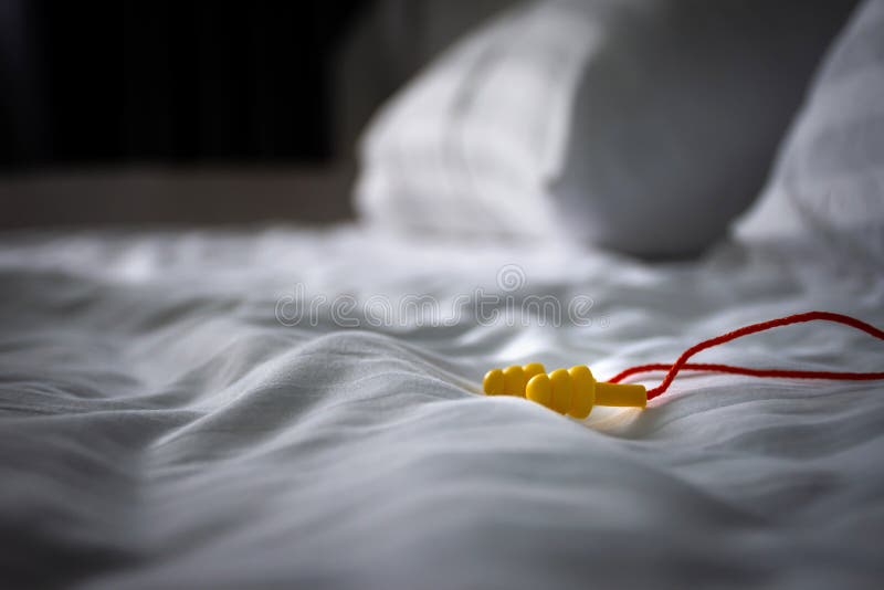 Ear plugs on the bed stock photo. Image of plugs, happy 182477654