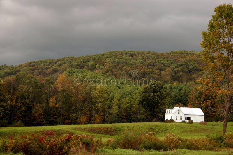 An early autumn storm comes over a New England mountain, preview of the severe weather of winter.