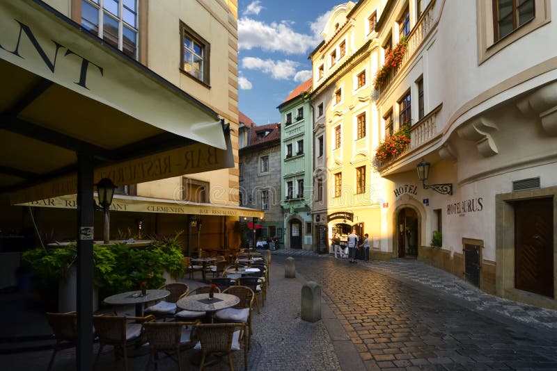 Early morning on a picturesque street with cafes and hotels in Old Town Prague, Czechia stock photos Early morning on a picturesque street with cafes and hotels in Old Town Prague, Czechia stock photos