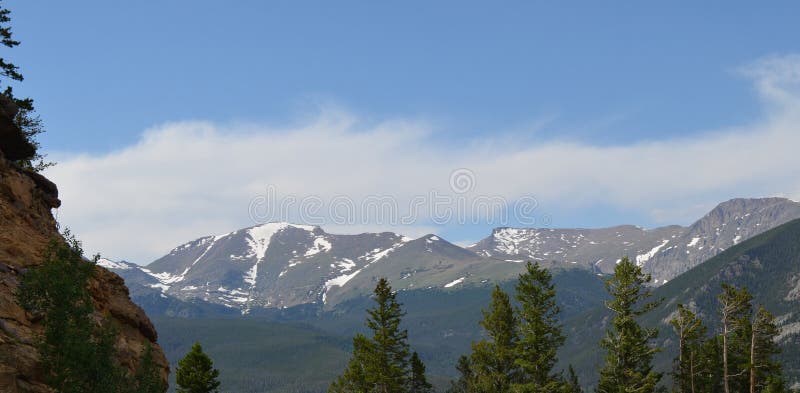 Summer in Rocky Mountain National Park: Fairchild Mtn, Hagues Peak and Mummy Mtn Seen from Many Parks Curve on Trail Ridge Road. Early Summer in Colorado royalty free stock photography Summer in Rocky Mountain National Park: Fairchild Mtn, Hagues Peak and Mummy Mtn Seen from Many Parks Curve on Trail Ridge Road. Early Summer in Colorado royalty free stock photography