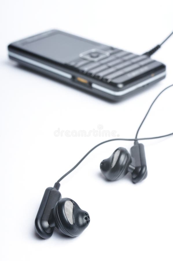 Earphones with GSM royalty free stock photos