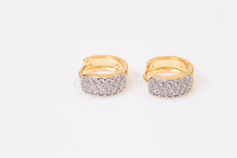 Earrings. Gold Hoop Earrings with Diamonds on the White Background