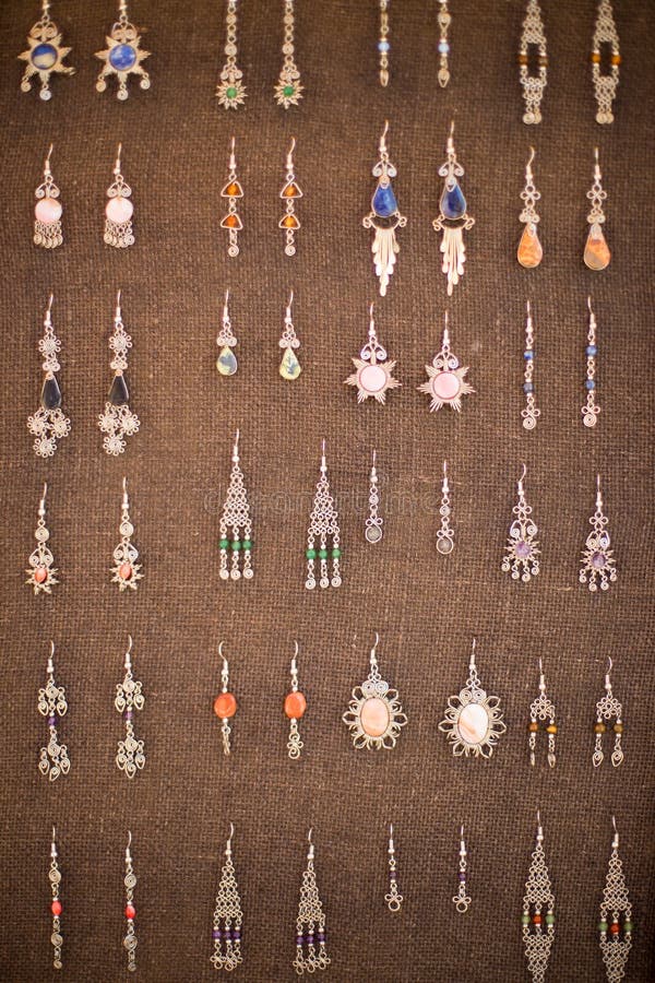 Earrings on a market stall stock image. Image of sale 101999451