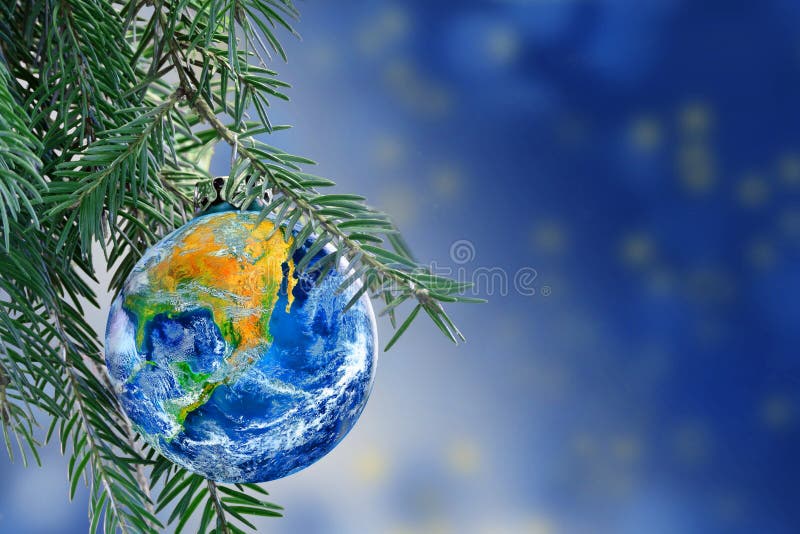 Earth globe as a Christmas bauble on fir branch, copy space