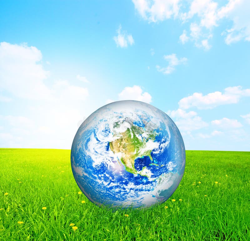 Earth globe on green grass stock photo. Image of background 8495102