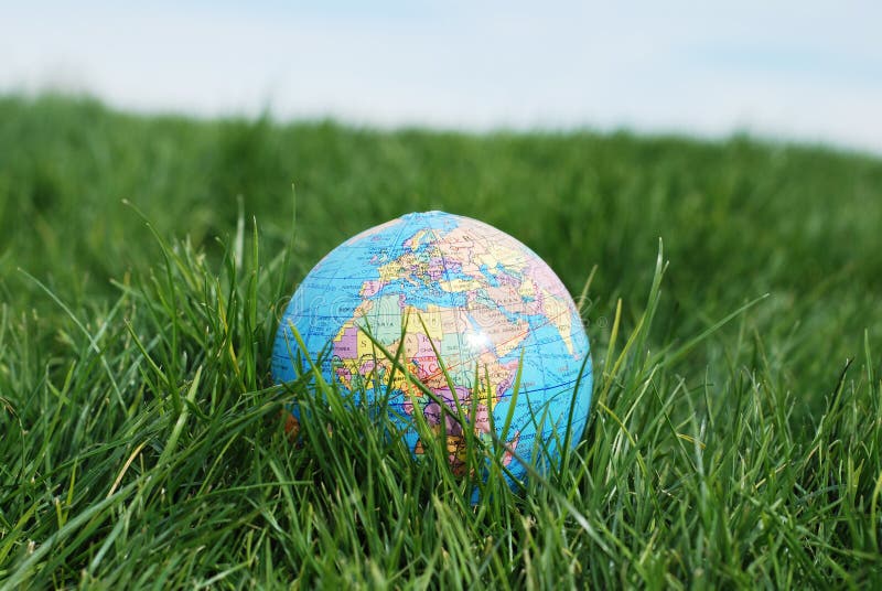 Earth on grass stock image. Image of earth, field, world 4057307