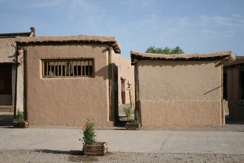 Earth house in ancient village Dunhuang, China