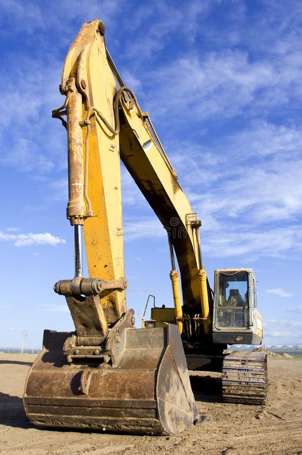Large earth mover. Claw machine stock images, royalty-free photos and pictures