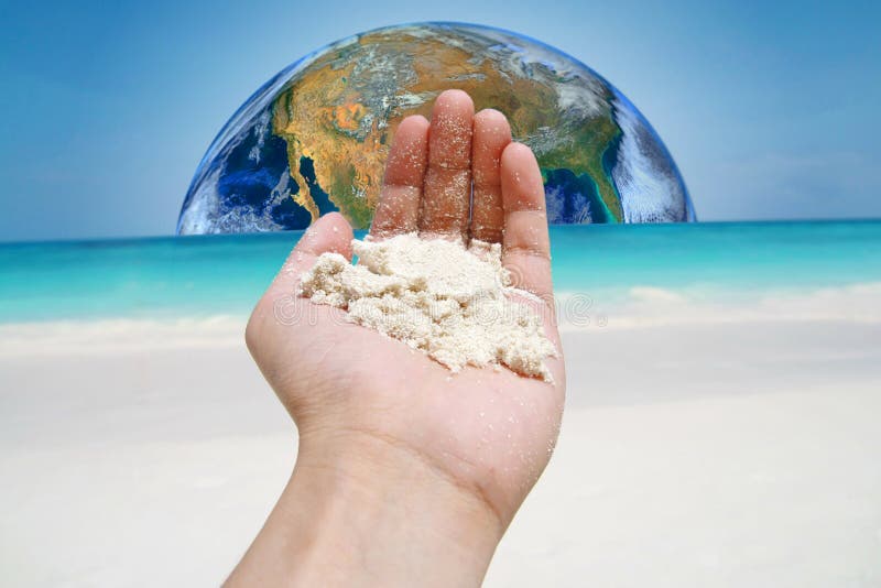 The Earth on Sand Beach, Including Elements Furnished by NASA Stock