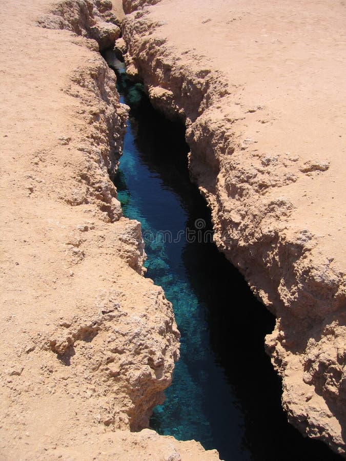 Earthquake fissure (now filled with water) in Ras Mohamed national park, the Sinai desert, Egypt.