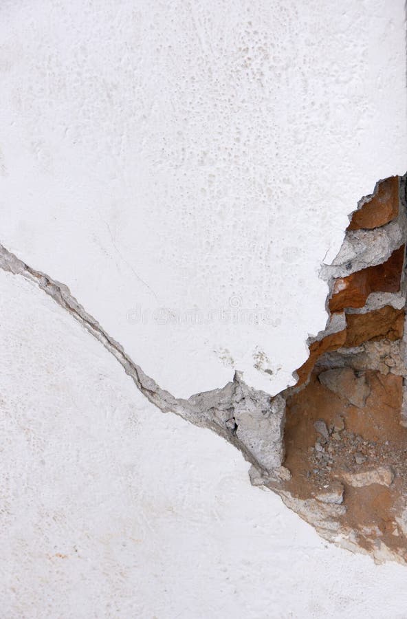 Wall damage due to earthquake. Wall damage due to earthquake.