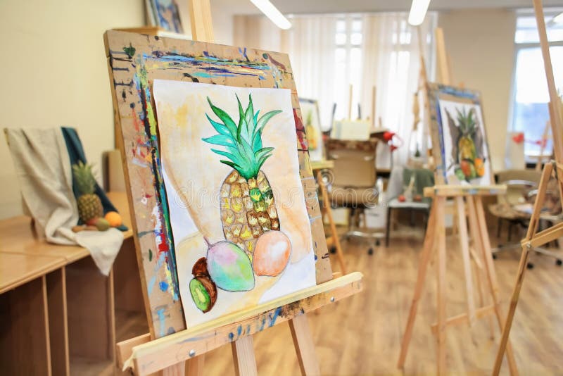 Easel with unfinished still life painting in artist's workshop stock photos Easel with unfinished still life painting in artist's workshop stock photos