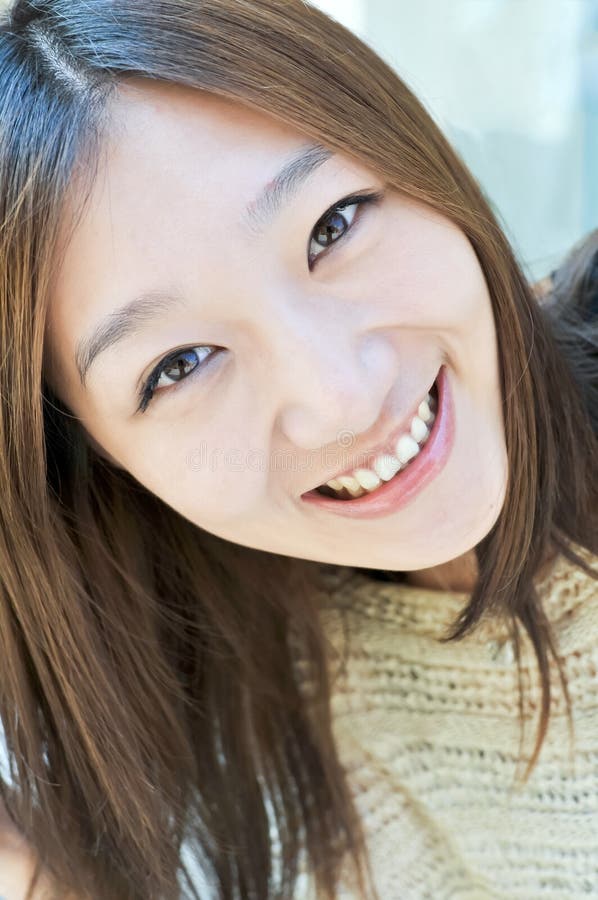 East asian girl smiling face