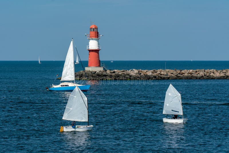 East pier with red beacon in Warnemuende royalty free stock photo East pier with red beacon in Warnemuende royalty free stock photo