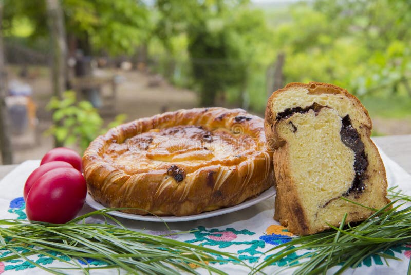 Traditional Romanian pasca, sweetbread, and Easter eggs