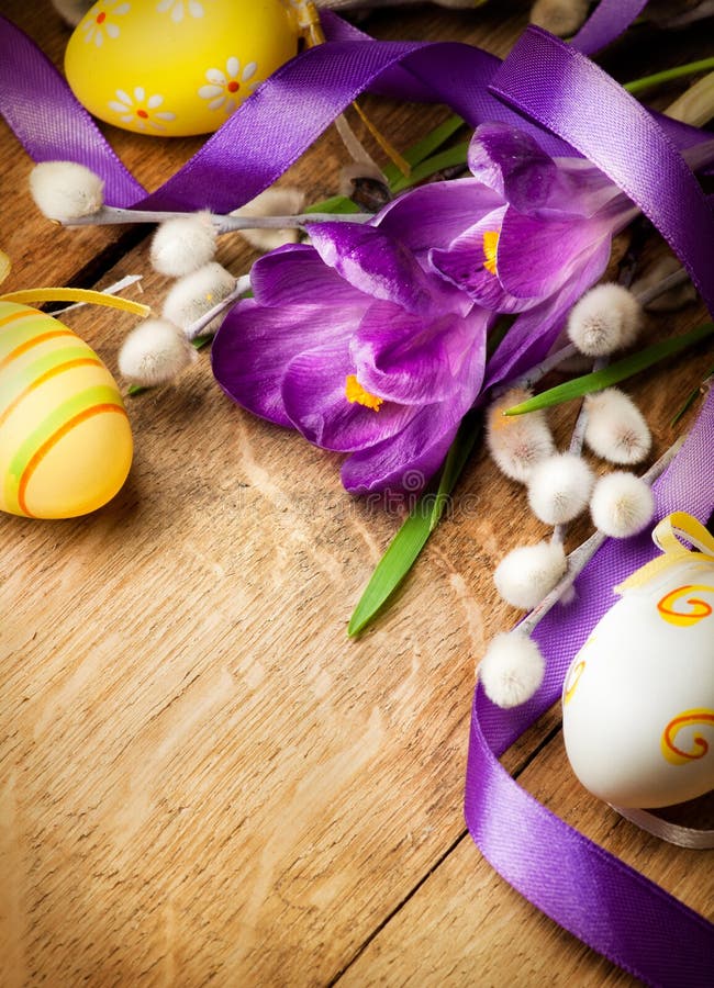Easter Background with Easter Eggs and Spring Flowers. Top View Stock