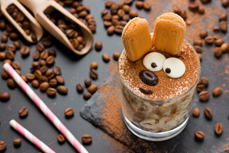 Easter bunny cake tiramisu dessert for children. Funny traditional Italian dessert serving, creative idea holiday sweet food for kids selective focuse stock photos Easter bunny cake tiramisu dessert for children. Funny traditional Italian dessert serving, creative idea holiday sweet food for kids selective focuse stock photos