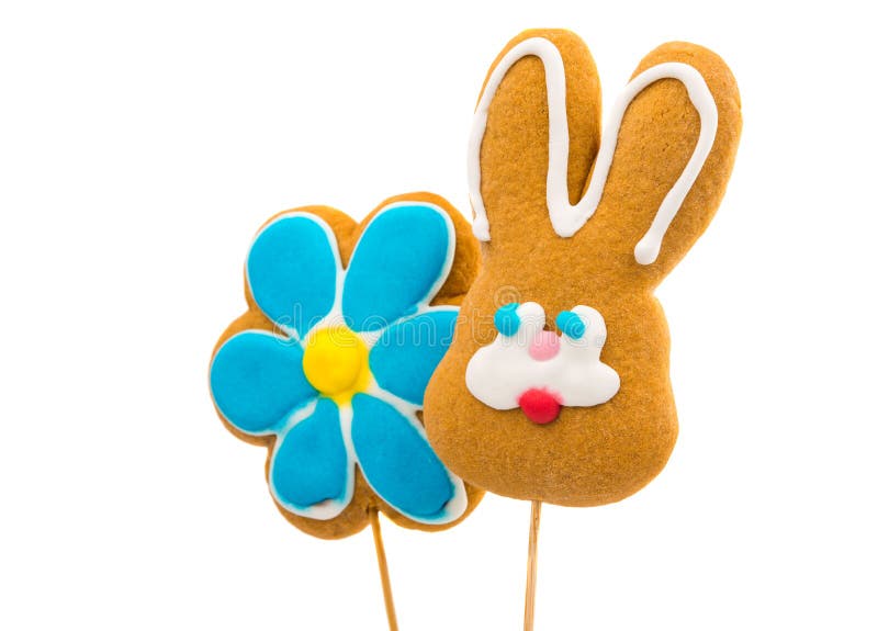 Easter bunny cookies and flower on a white background