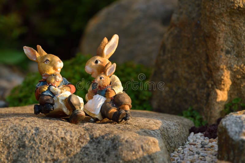 Easter bunny family in a garden