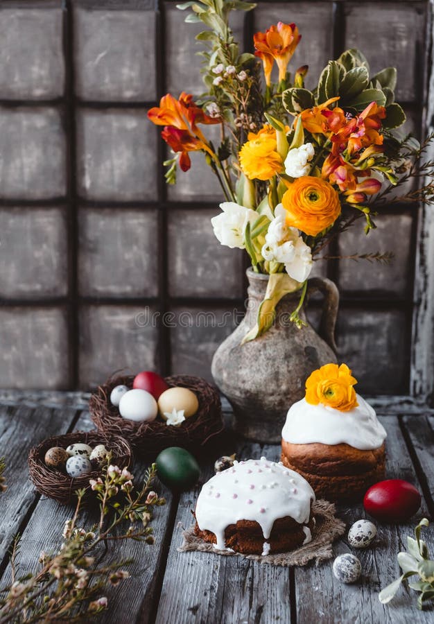 Easter celebrating table with Easter cakes and eggs