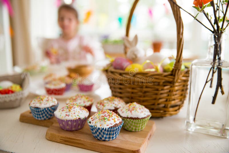 Easter celebration, close-up table with glazed cupcakes, royalty free stock photo Easter celebration, close-up table with glazed cupcakes, royalty free stock photo