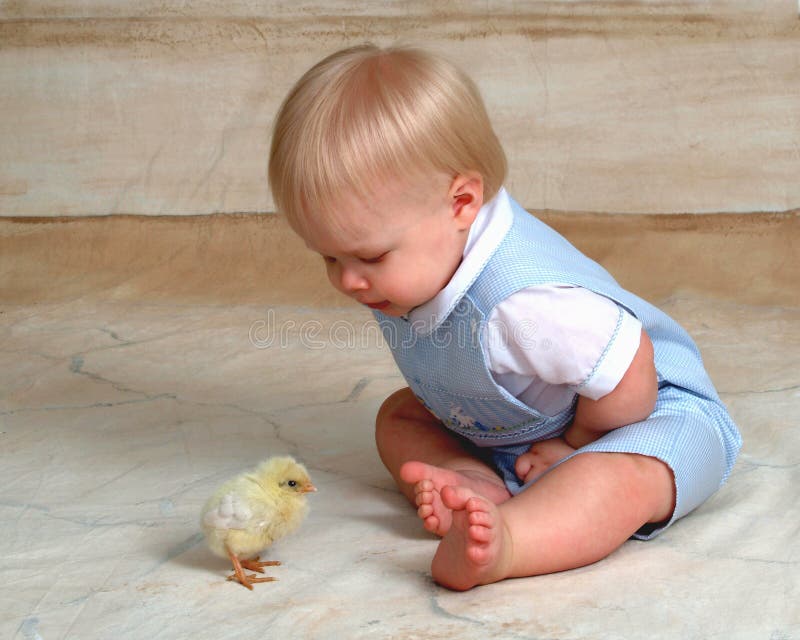 Baby and Easter Chick stock image. Image of easter, expression 4134449