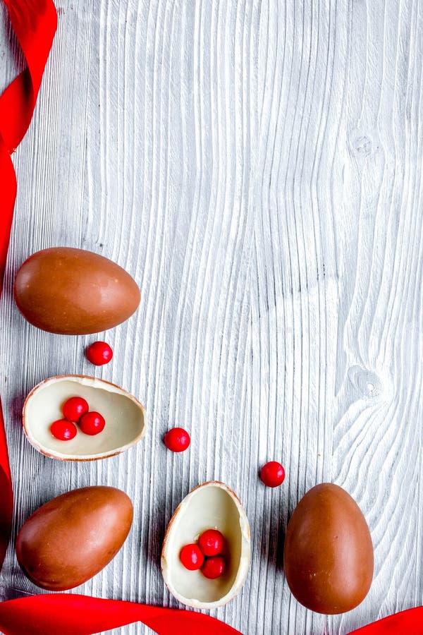 Download Easter Chocolate Eggs Top View On Wooden Background Mock Up Stock Photo - Image of surprise ...