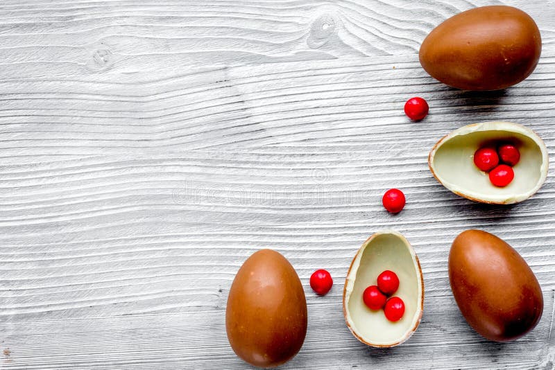 Download Easter Chocolate Eggs Top View On Wooden Background Mock Up Stock Image - Image of candy, gift ...