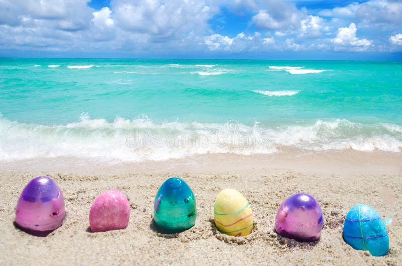 Easter Color Eggs on the Beach Near Ocean Stock Photo Image of