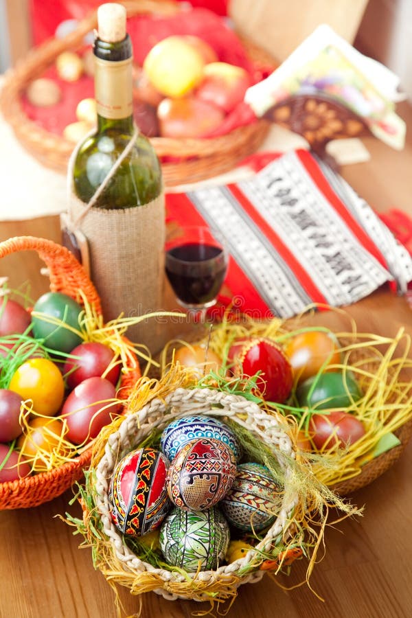 Easter colorful eggs with wine glass and bottle