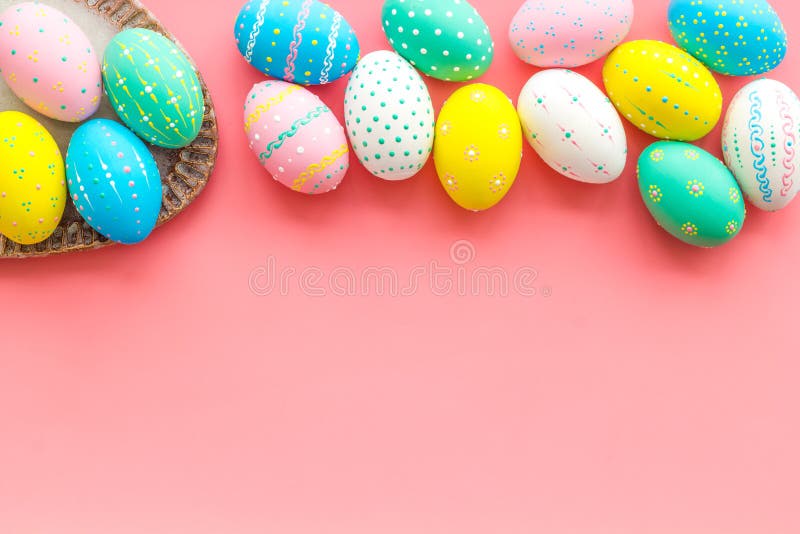 Easter Composition. Decorated Pastel Easter Eggs on Pink Background Top