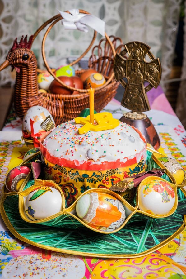 Easter composition of Easter cake, painted eggs and other Easter elements.