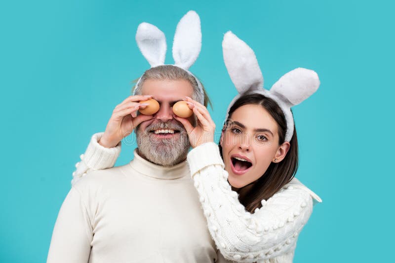 Easter Couple. Happy Smiling Couple with Easter Eggs. Stock Image