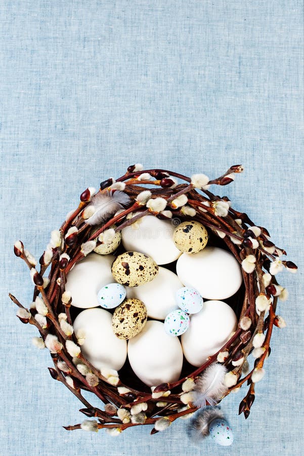 Easter decoration with blooming willow branches and eggs stock photography