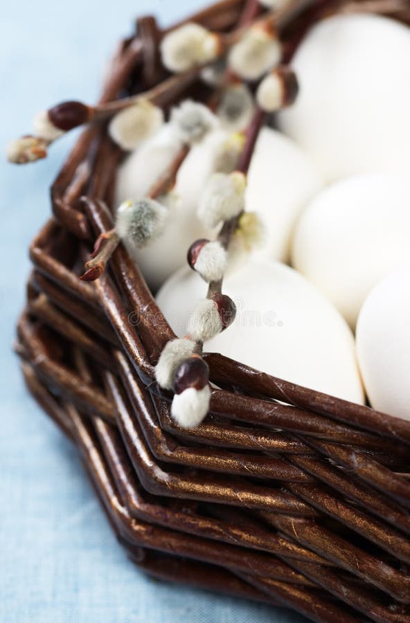 Easter decoration with blooming willow branches and eggs stock image