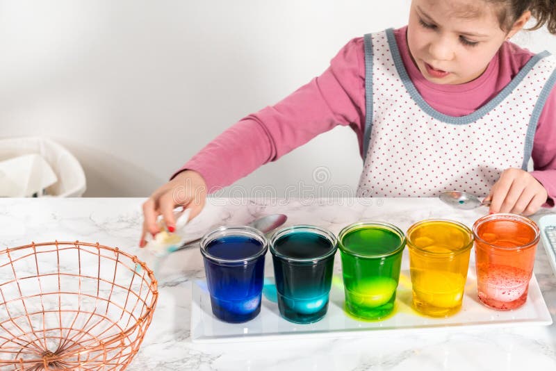 Easter egg coloring stock photo. Image of caucasian 278823170
