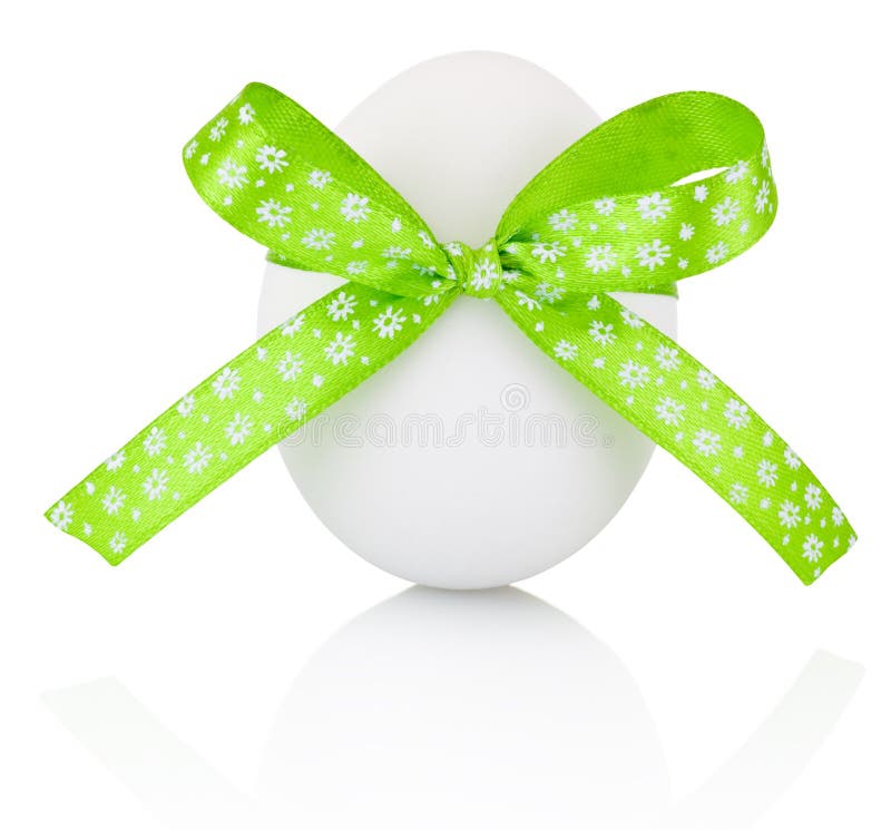 Easter egg with festive green bow isolated on white background stock photos Easter egg with festive green bow isolated on white background stock photos