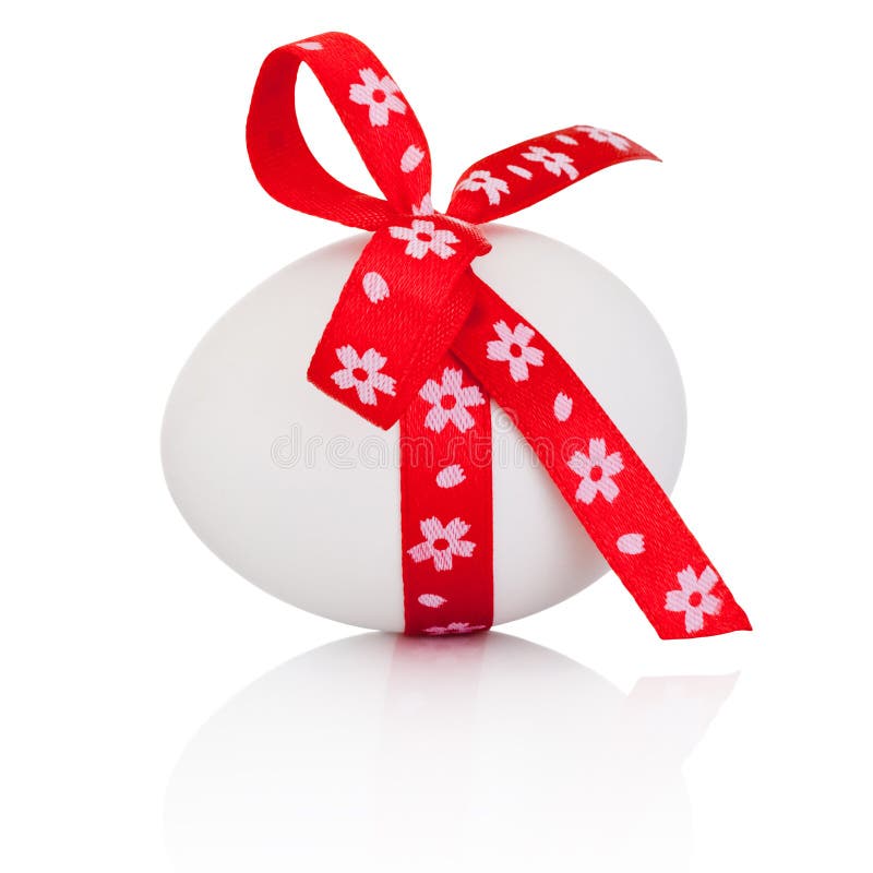 Easter egg with festive red bow isolated on white background royalty free stock photos Easter egg with festive red bow isolated on white background royalty free stock photos