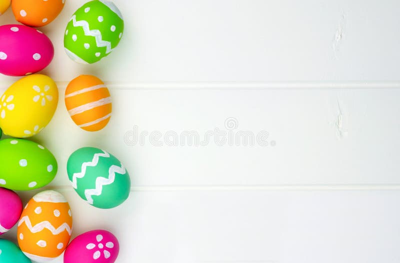 Easter egg side border against white wood stock photo Easter egg side border against white wood stock photo