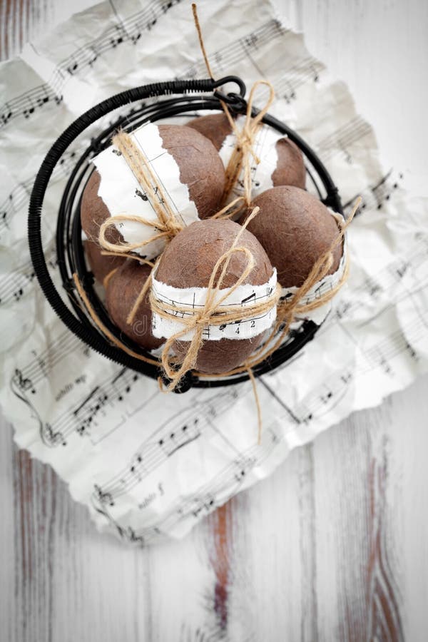 Brown easter eggs with musical notes and ribbon. Colorful musical notes stock images, royalty-free photos and pictures