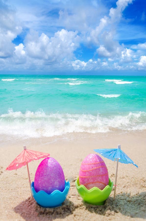 Easter eggs on the beach stock image. Image of bright 36531307