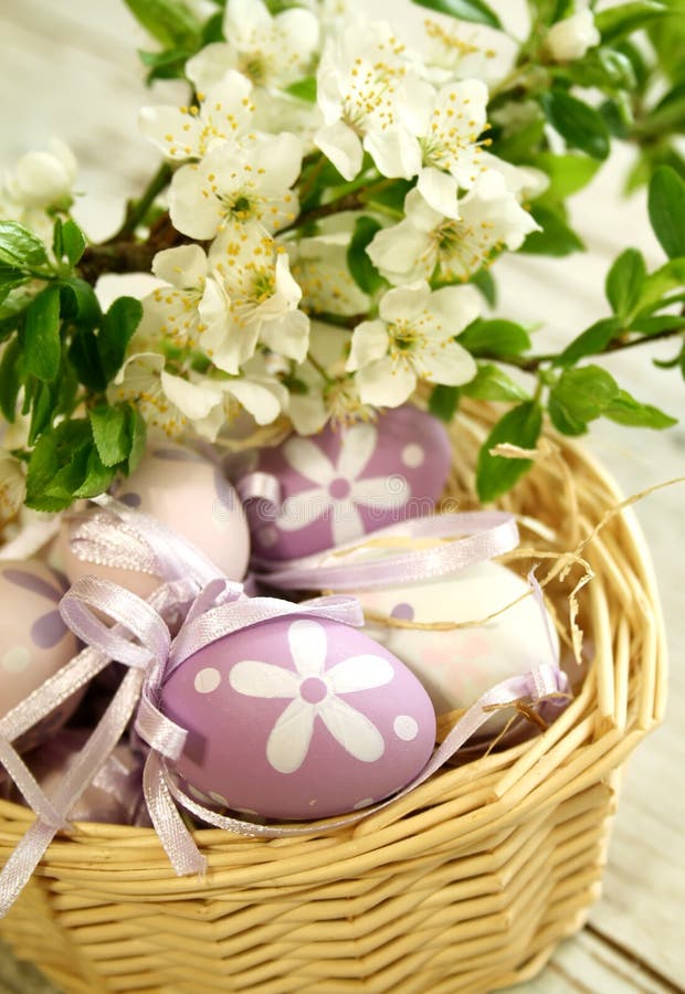 Easter eggs and branch with flowers